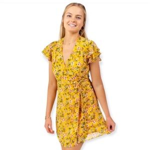 Harper Heritage sold by Francesca’s Yellow Floral Wrap Dress